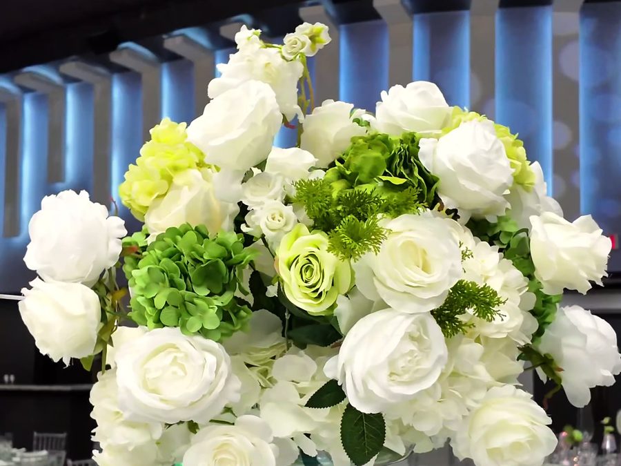 White rose and green hydrangea floral arrangement